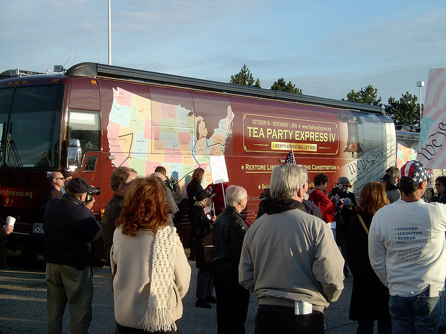 Tea Party Express Buses pulling into lot.